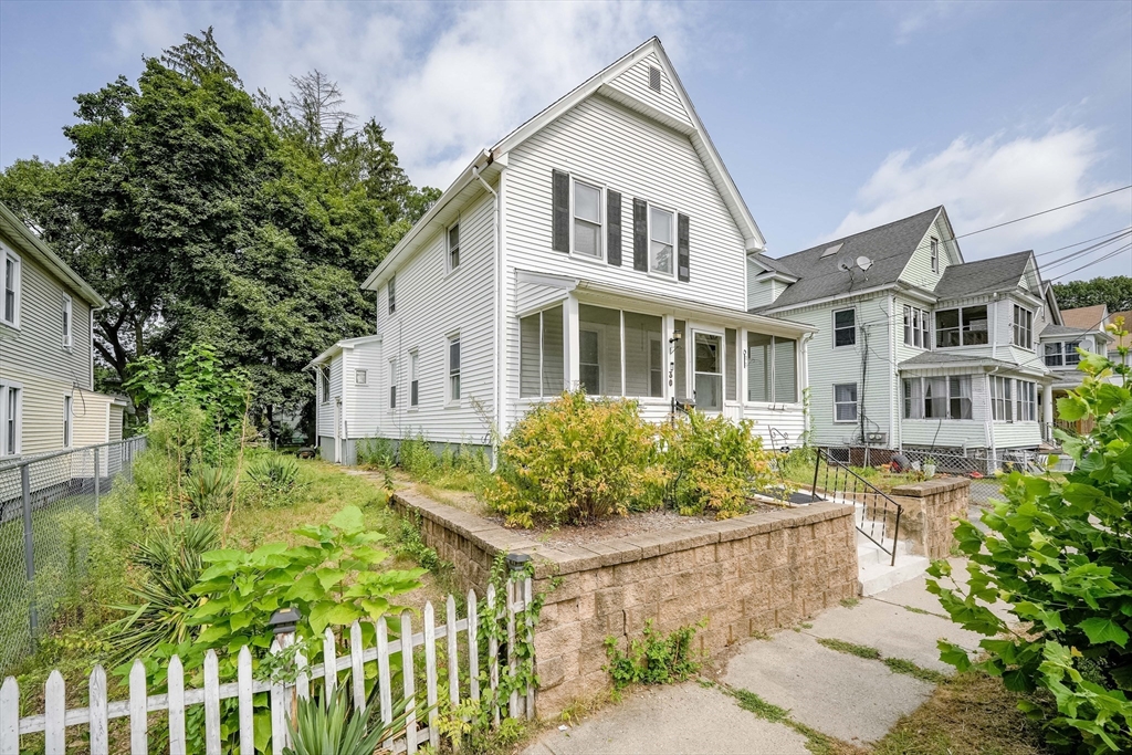 30 Beauchamp Street Springfield, MA 01107 - Photo 2 of 30 a front view of a house with a garden