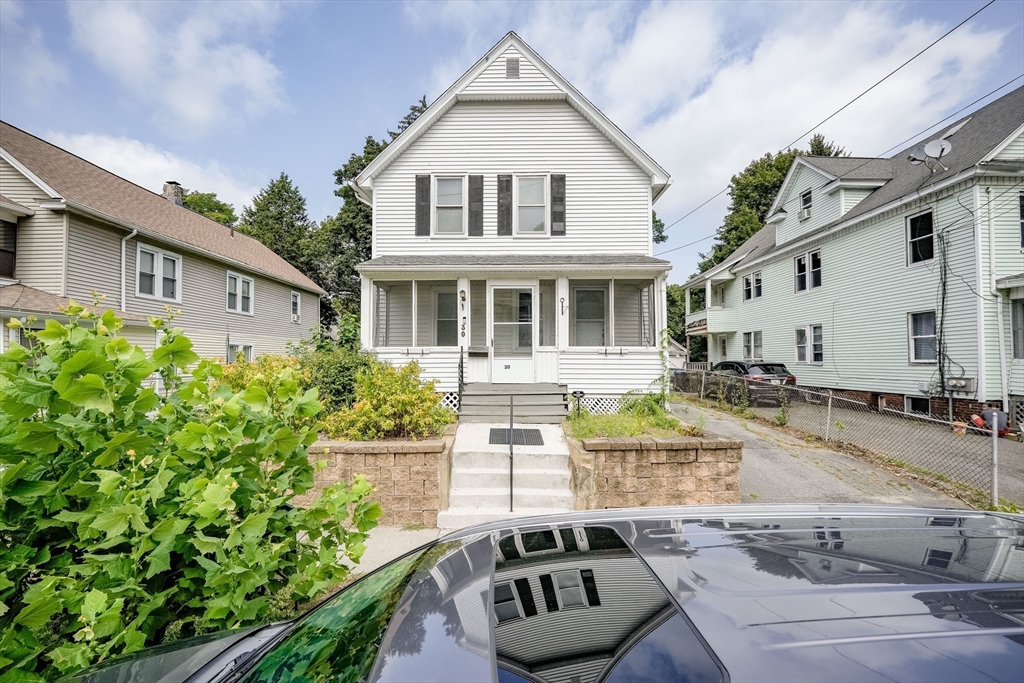 30 Beauchamp Street Springfield, MA 01107 - Photo 3 of 30 a front view of a house with garden