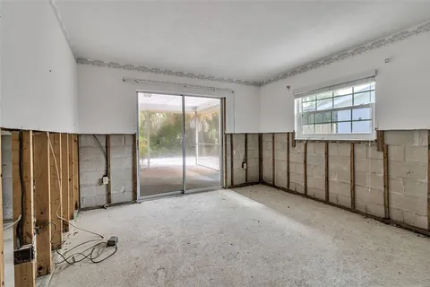 a view of a room with a large window