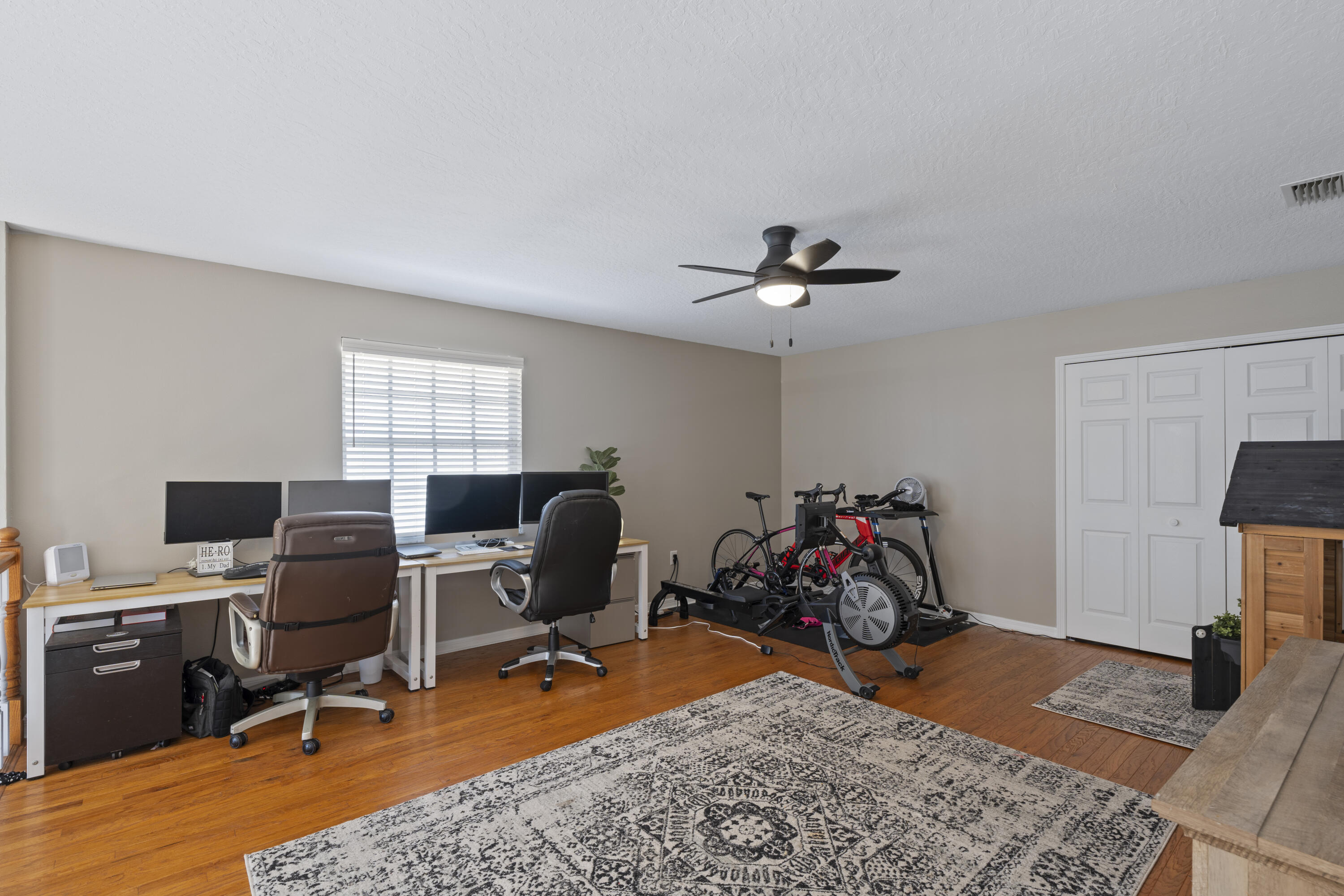 2639 Lowell Circle Melbourne, FL 32935 - Photo 28 of 46 a view of a workspace with furniture and a window