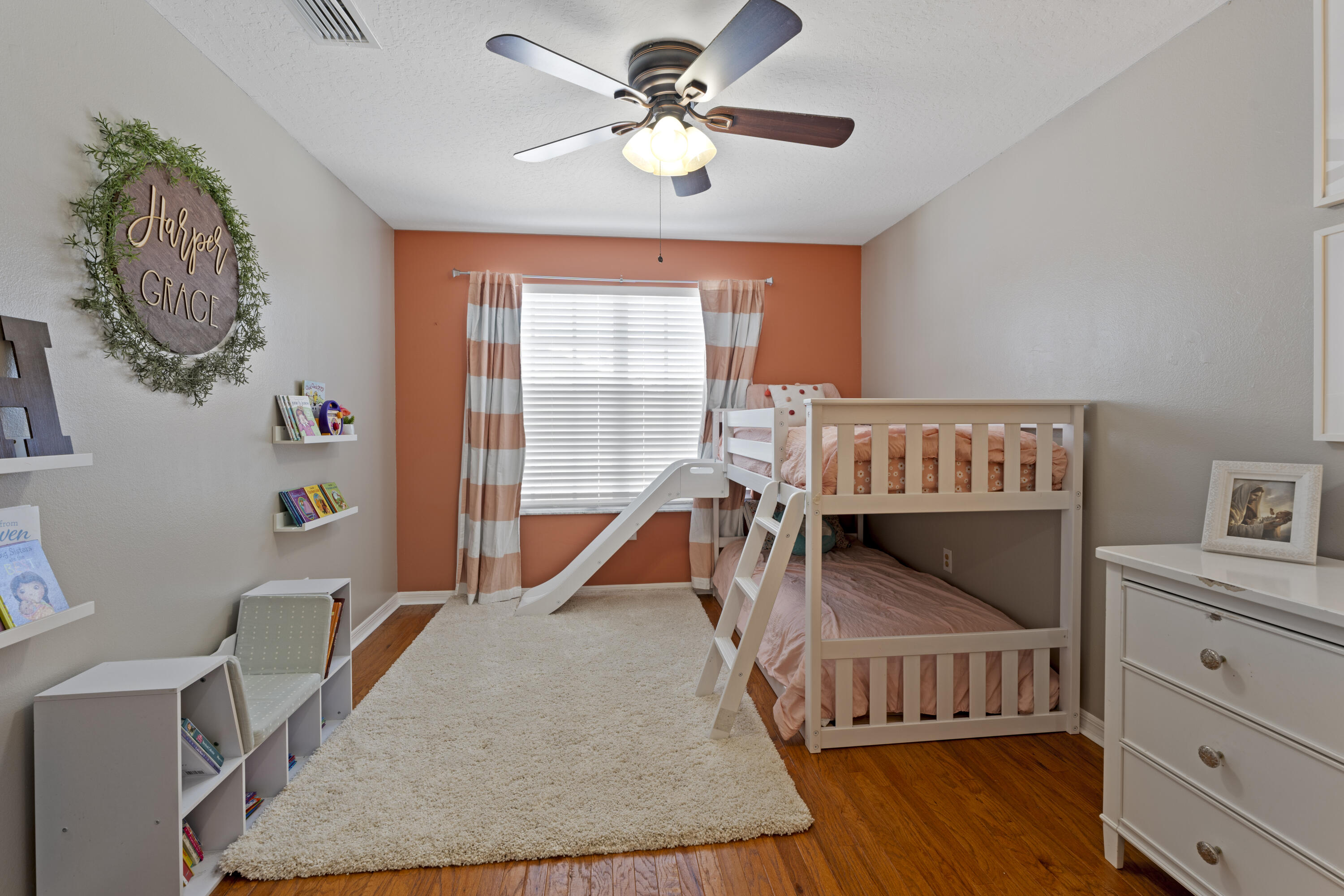 2639 Lowell Circle Melbourne, FL 32935 - Photo 30 of 46 a bedroom with furniture and a window