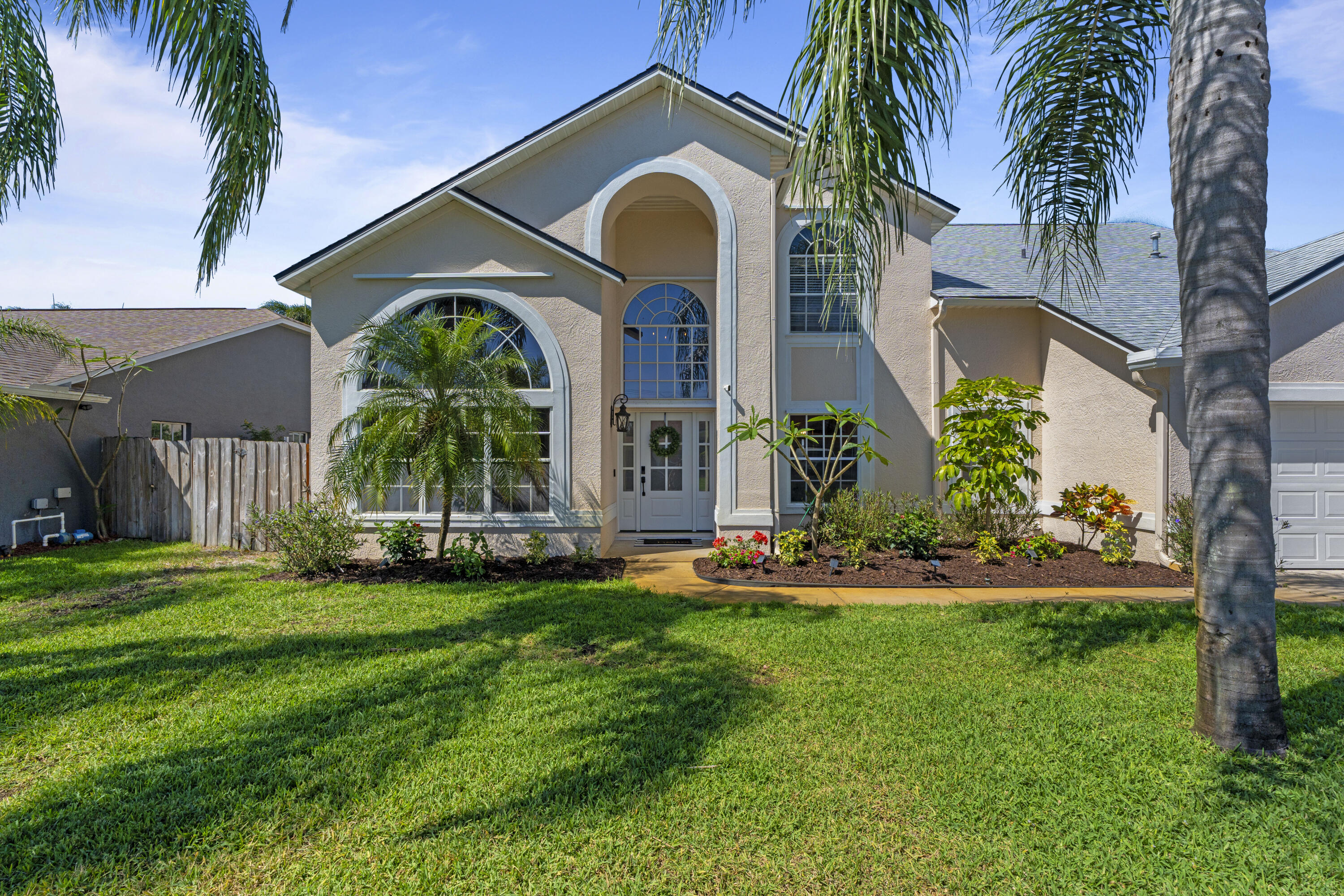 2639 Lowell Circle Melbourne, FL 32935 - Photo 45 of 46 a front view of house with yard and green space