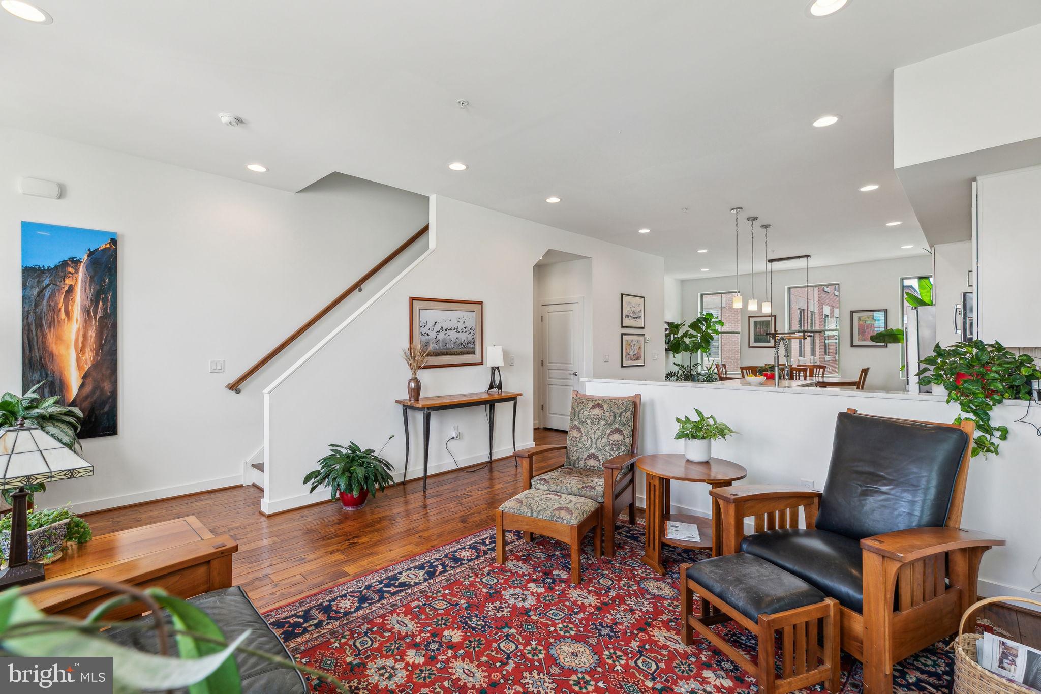 410 Reed Street Philadelphia, PA 19147 - Photo 12 of 39 a living room with furniture and a flat screen tv