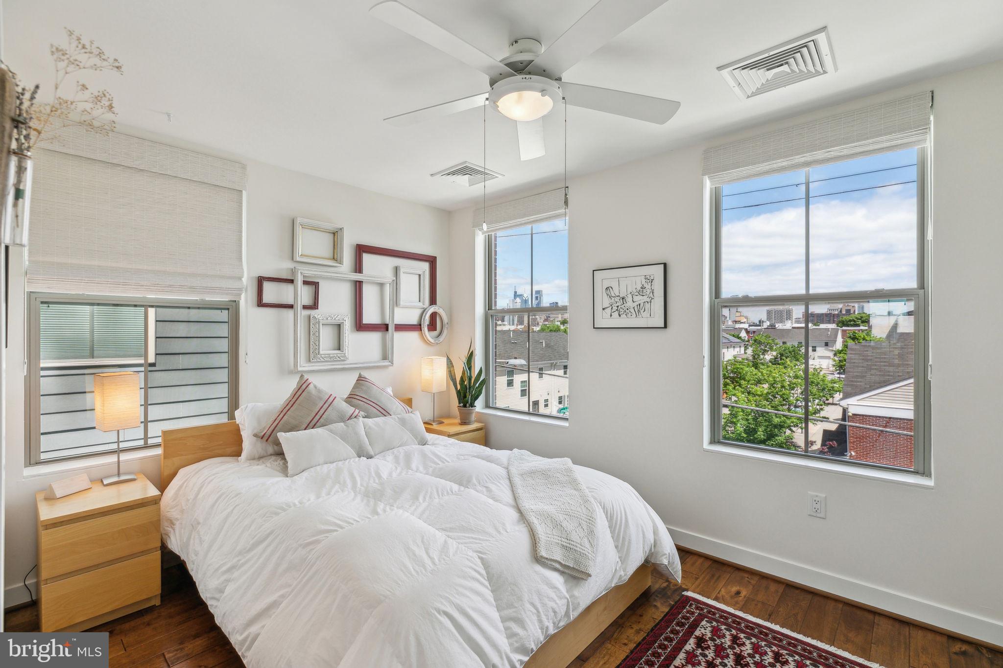 410 Reed Street Philadelphia, PA 19147 - Photo 13 of 39 a bedroom with a bed and a window