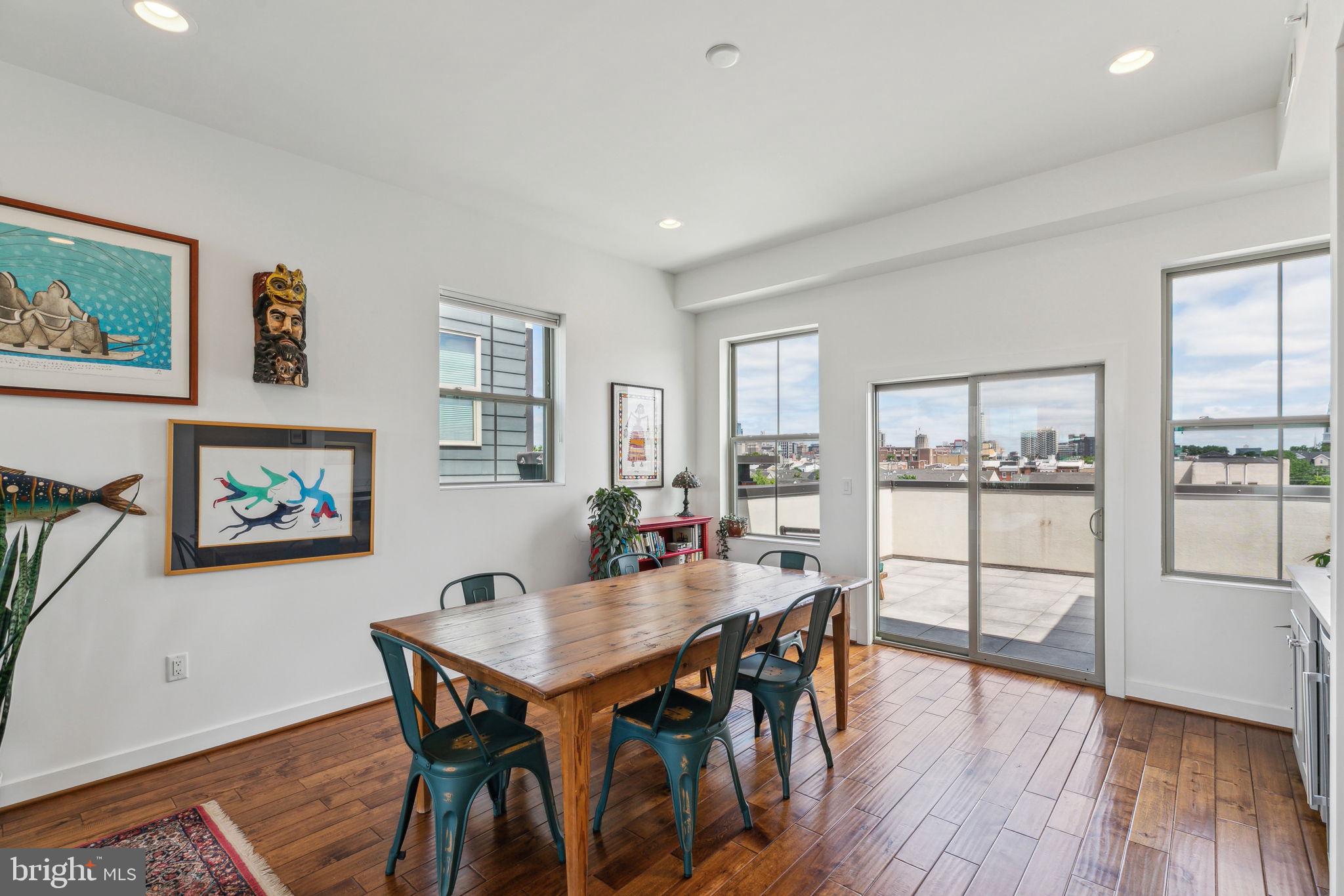 410 Reed Street Philadelphia, PA 19147 - Photo 24 of 39 a view of a dining room with furniture and wooden floor