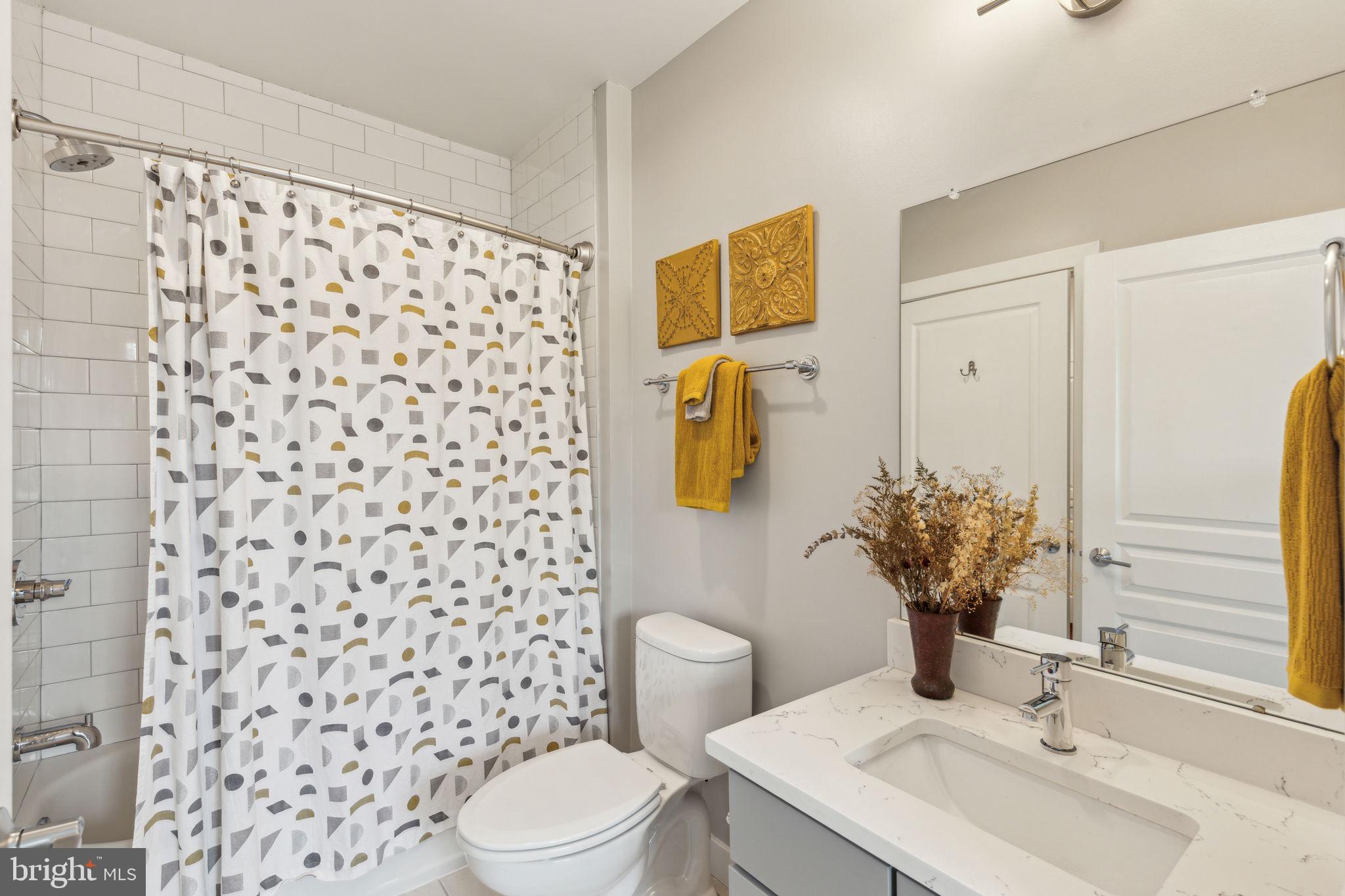 410 Reed Street Philadelphia, PA 19147 - Photo 32 of 39 a bathroom with a sink toilet and shower