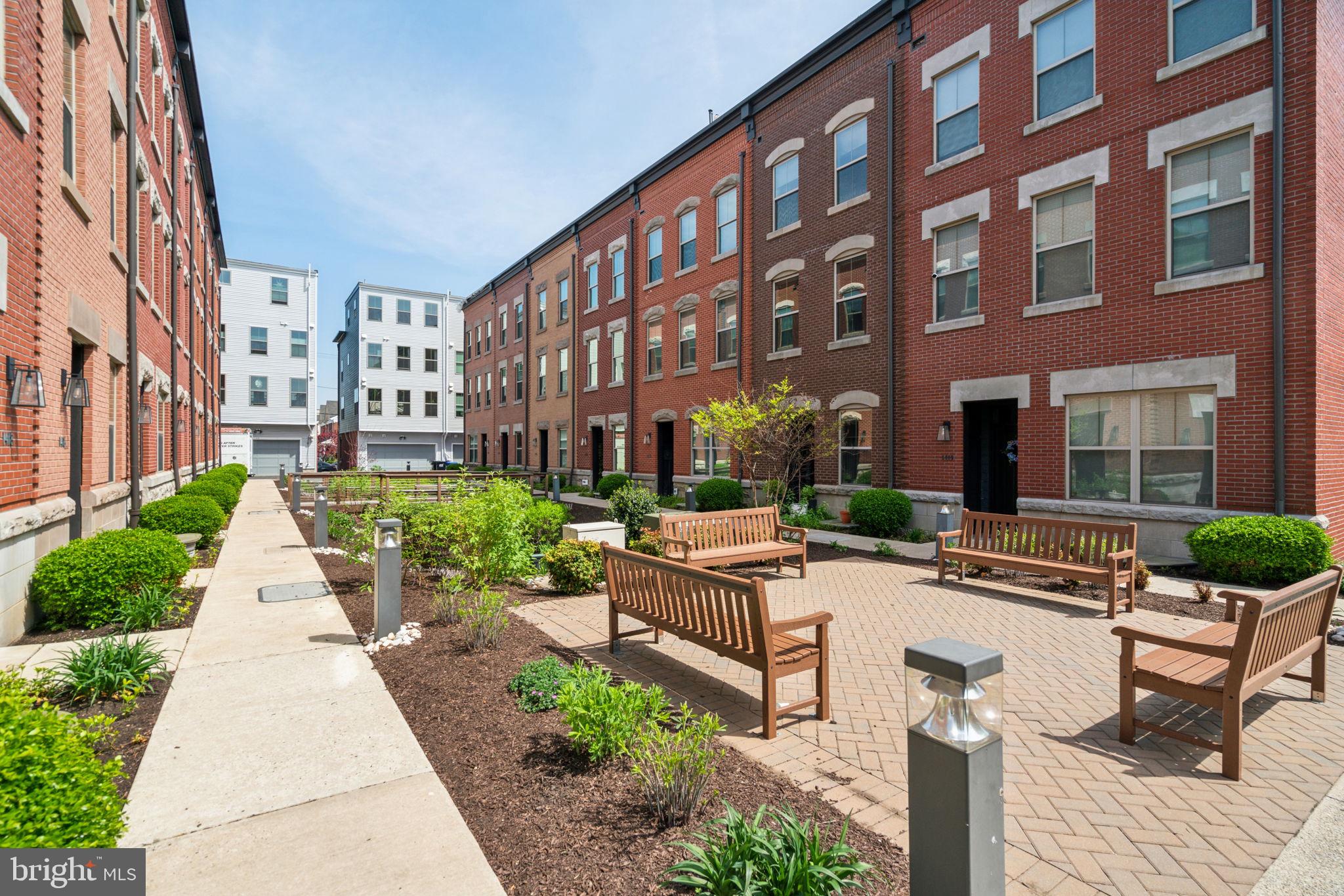 410 Reed Street Philadelphia, PA 19147 - Photo 38 of 39 a view of a building with garden and sitting area