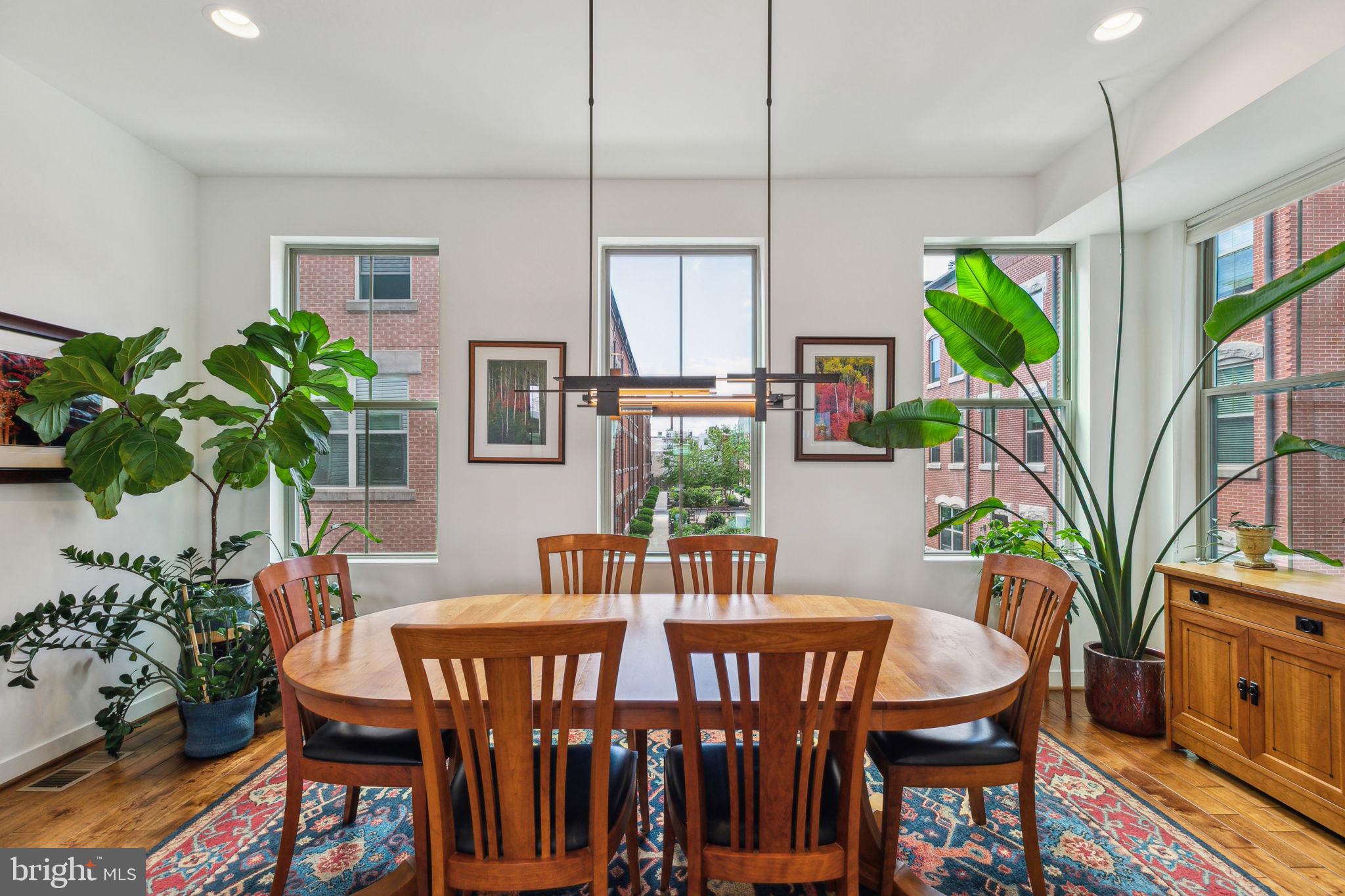 410 Reed Street Philadelphia, PA 19147 - Photo 6 of 39 a view of a dining room with furniture window and wooden floor
