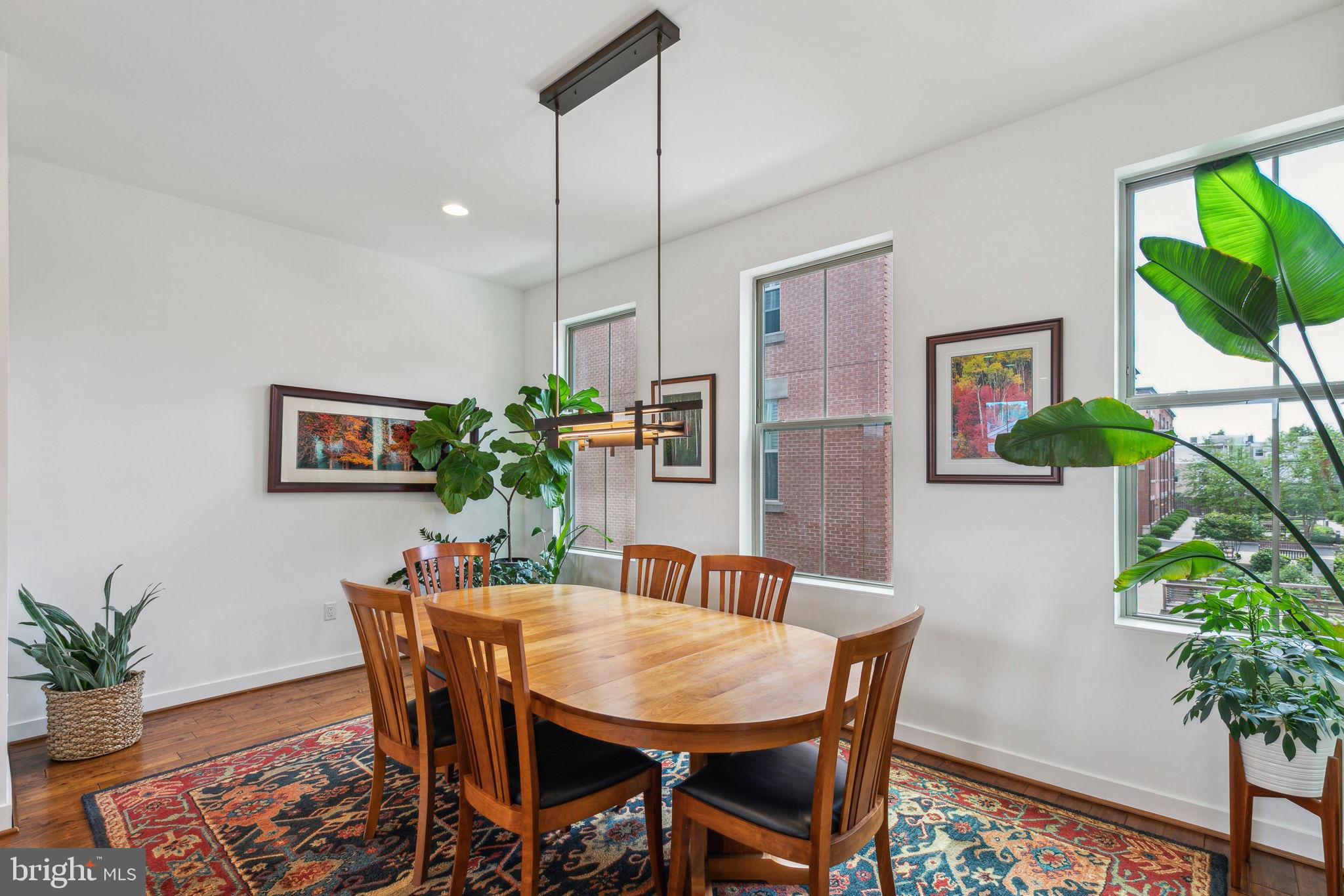 410 Reed Street Philadelphia, PA 19147 - Photo 7 of 39 a view of a dining room with furniture and a potted plant