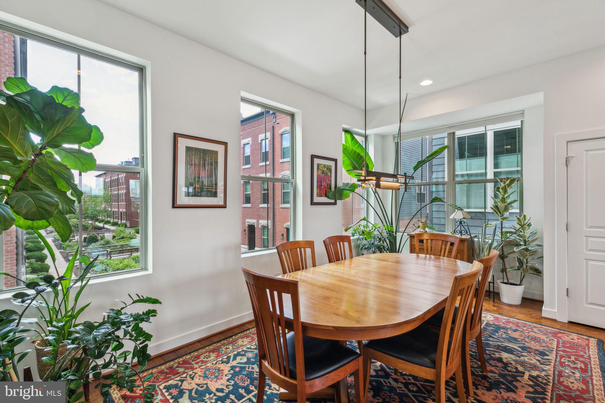 410 Reed Street Philadelphia, PA 19147 - Photo 8 of 39 a view of a dining room with furniture window and wooden floor