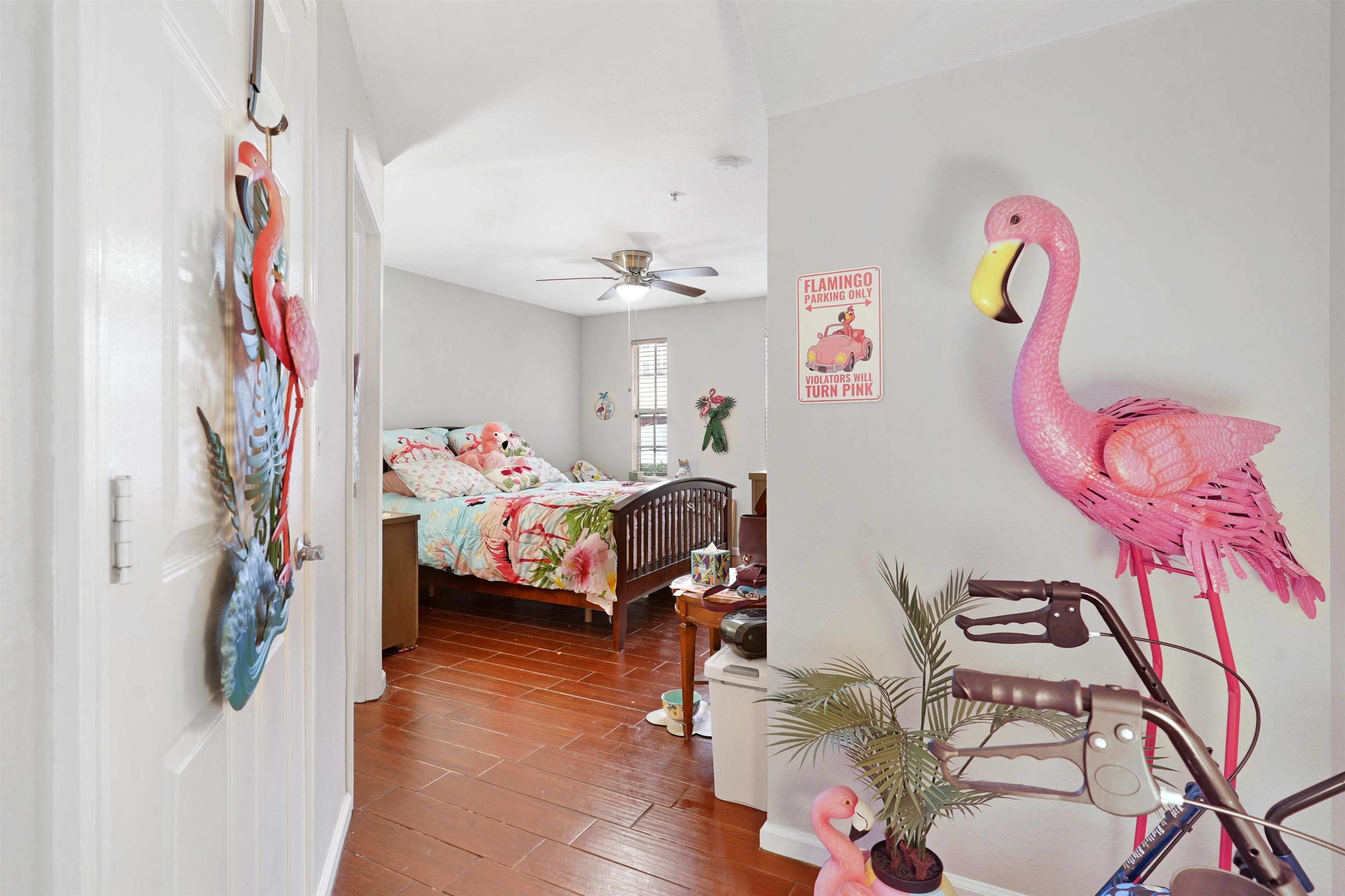 10075 Gate Parkway, Unit 203 Jacksonville, FL 32246 - Photo 23 of 34 a bedroom with furniture and a chandelier
