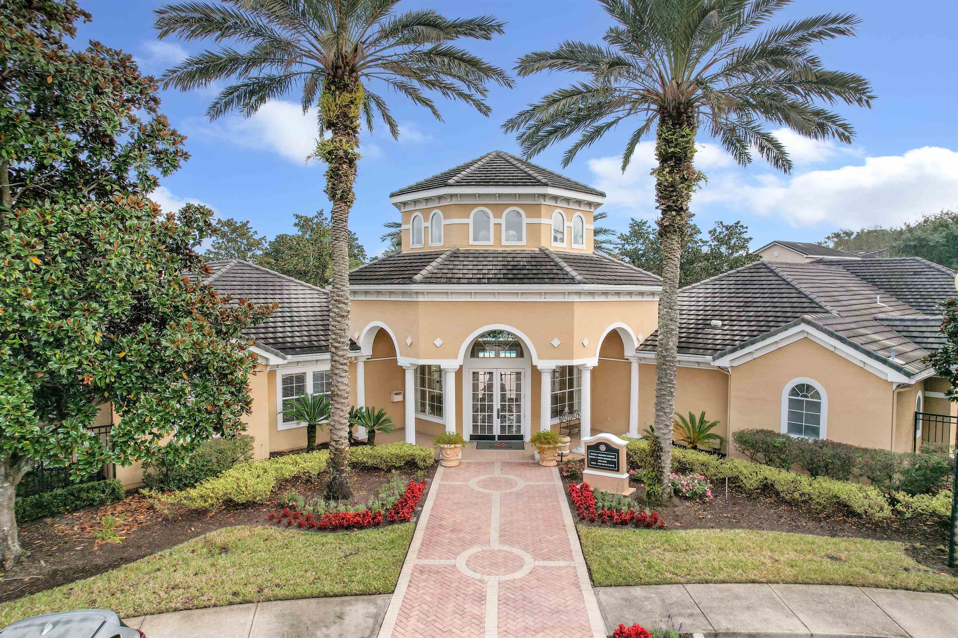 10075 Gate Parkway, Unit 203 Jacksonville, FL 32246 - Photo 28 of 34 a front view of a house with garden