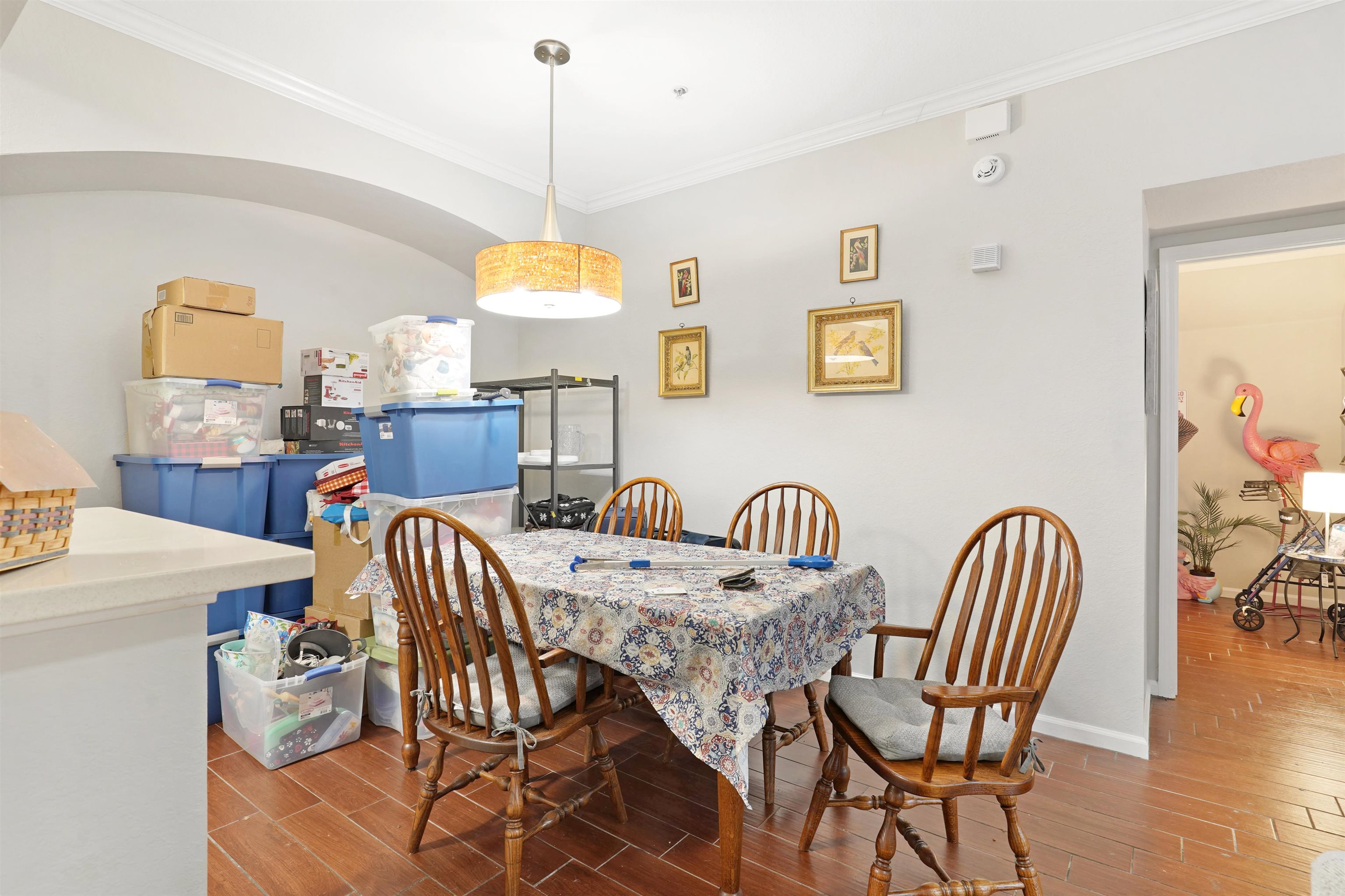 10075 Gate Parkway, Unit 203 Jacksonville, FL 32246 - Photo 7 of 34 a dining room with furniture a window and wooden floor