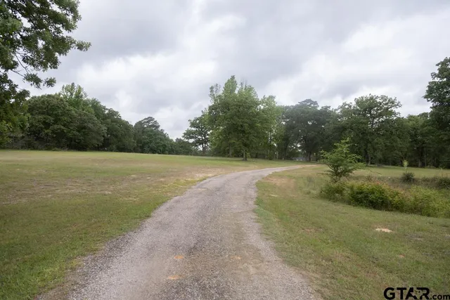 a view of a lake view with houses in back
