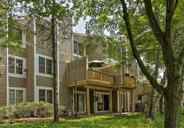 front view of a house with a garden