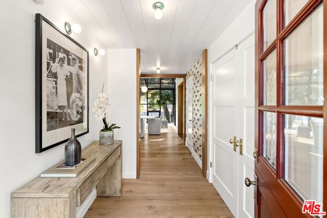 a view of living room with a large window