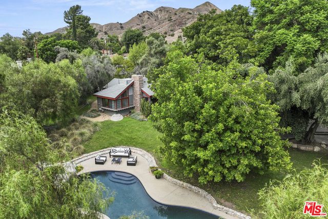 a balcony with a couch and table