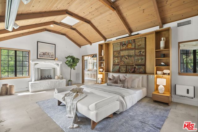 a view of a town with mountains in the background