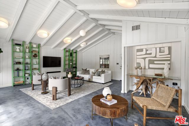 a house with trees in the background