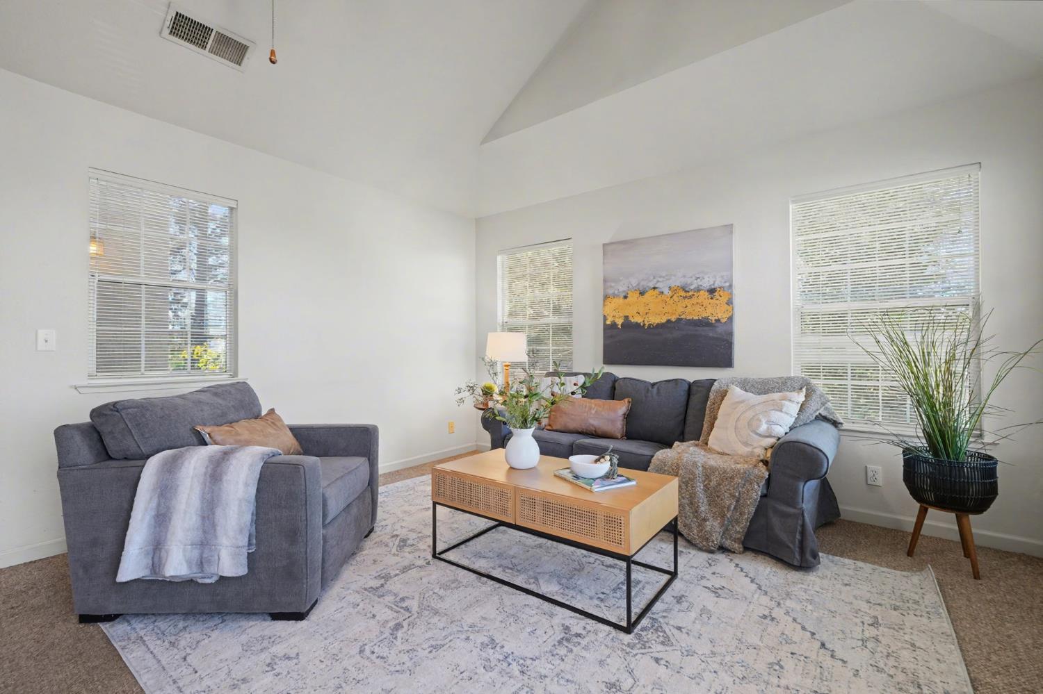 238 Highland Drive Sutter Creek, CA 95685 - Photo 17 of 52 a living room with furniture ceiling fan and a window