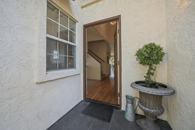 a vase of flowers sitting on a table