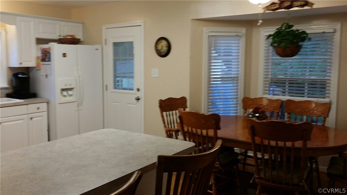 10149 Carol Anne Road Chesterfield, VA 23832 - Photo 9 of 21 a dining room with furniture and window