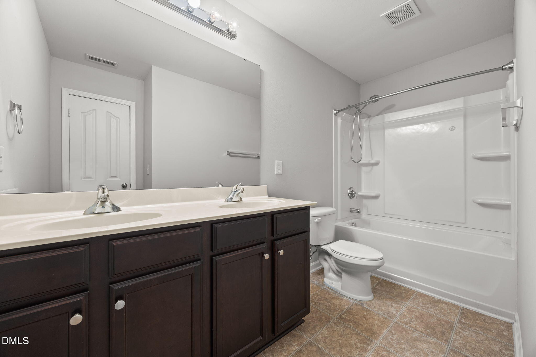 45 Crane Way Bunnlevel, NC 28323 - Photo 29 of 35 a bathroom with a double vanity sink toilet mirror and bathtub