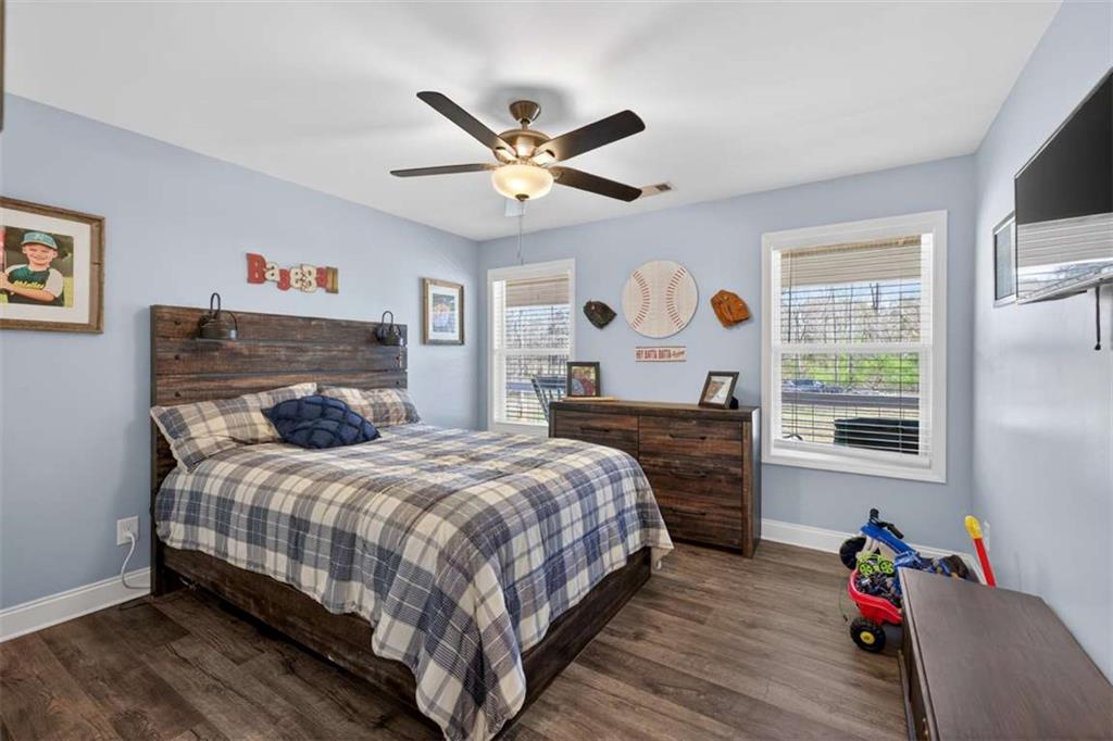 2361 County Line Road Mansfield, GA 30055 - Photo 24 of 57 a bedroom with a bed and a window