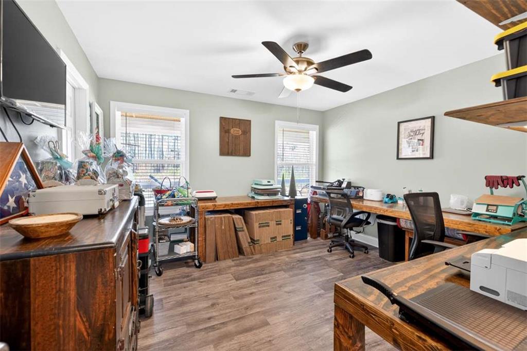 2361 County Line Road Mansfield, GA 30055 - Photo 28 of 57 a living room with lots of furniture and a window