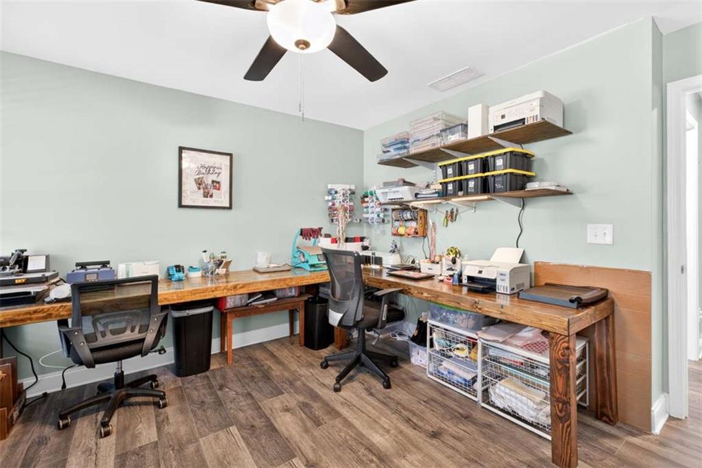 2361 County Line Road Mansfield, GA 30055 - Photo 29 of 57 a view of a workspace with furniture and a workspace
