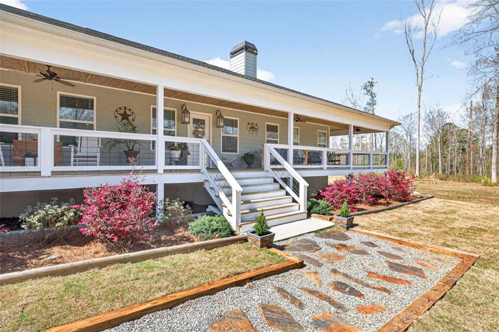 2361 County Line Road Mansfield, GA 30055 - Photo 3 of 57 front view of a house with a small yard