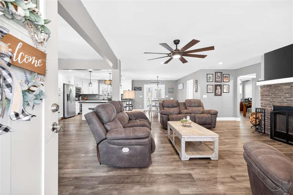 2361 County Line Road Mansfield, GA 30055 - Photo 5 of 57 a living room with furniture and a fireplace