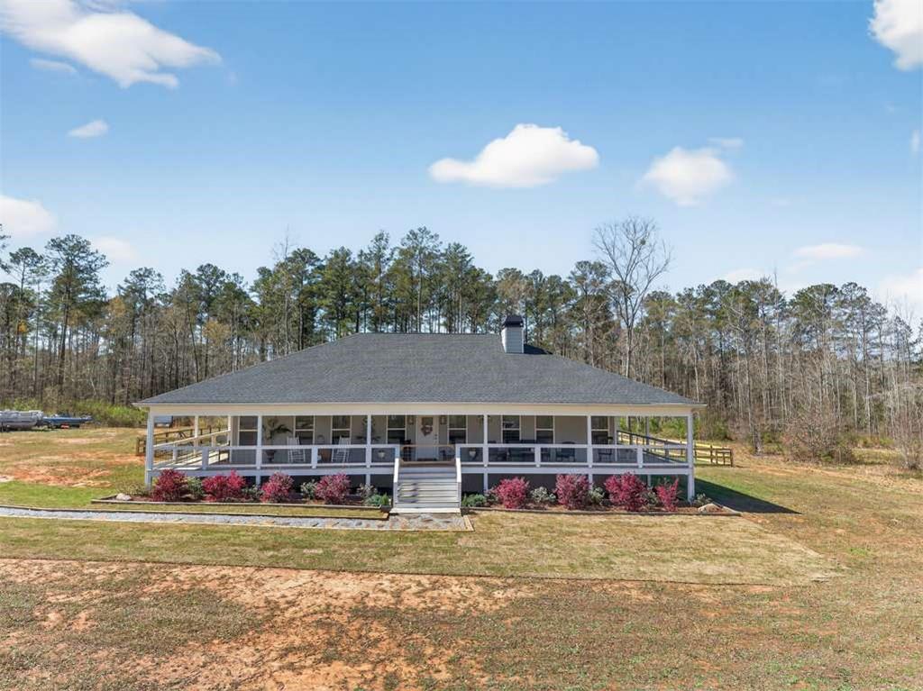 2361 County Line Road Mansfield, GA 30055 - Photo 56 of 57 a view of a house next to a big yard