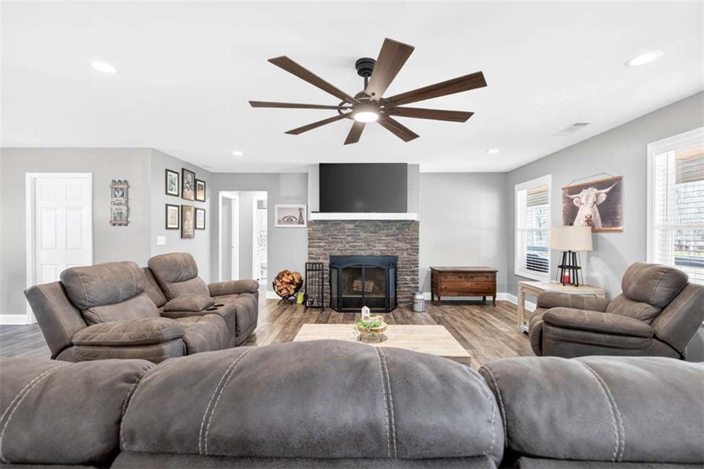 2361 County Line Road Mansfield, GA 30055 - Photo 6 of 57 a living room with furniture and a fireplace