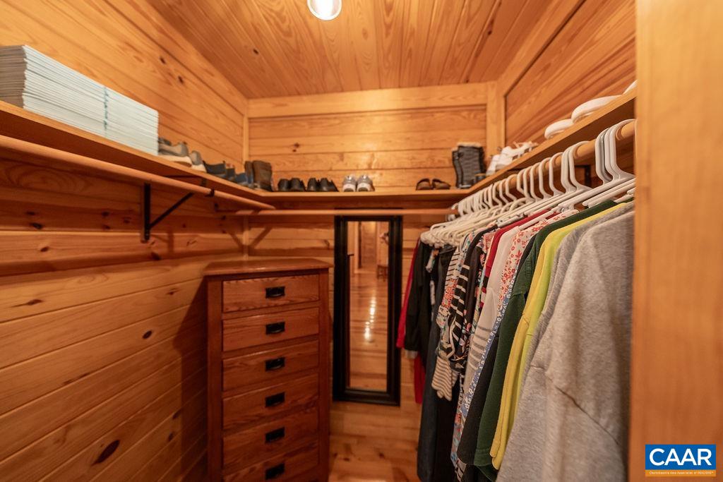 6033 Amicus Road Ruckersville, VA 22968 - Photo 39 of 74 a view of walk in closet with clothes
