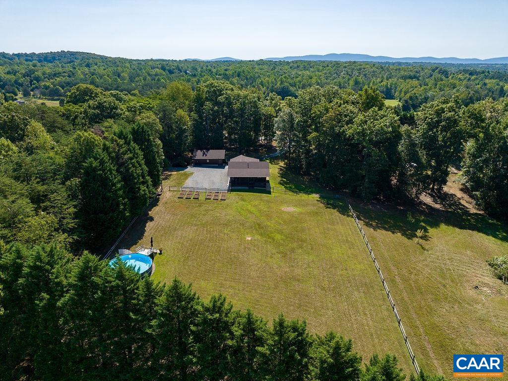 6033 Amicus Road Ruckersville, VA 22968 - Photo 72 of 74 a view of a swimming pool with a yard