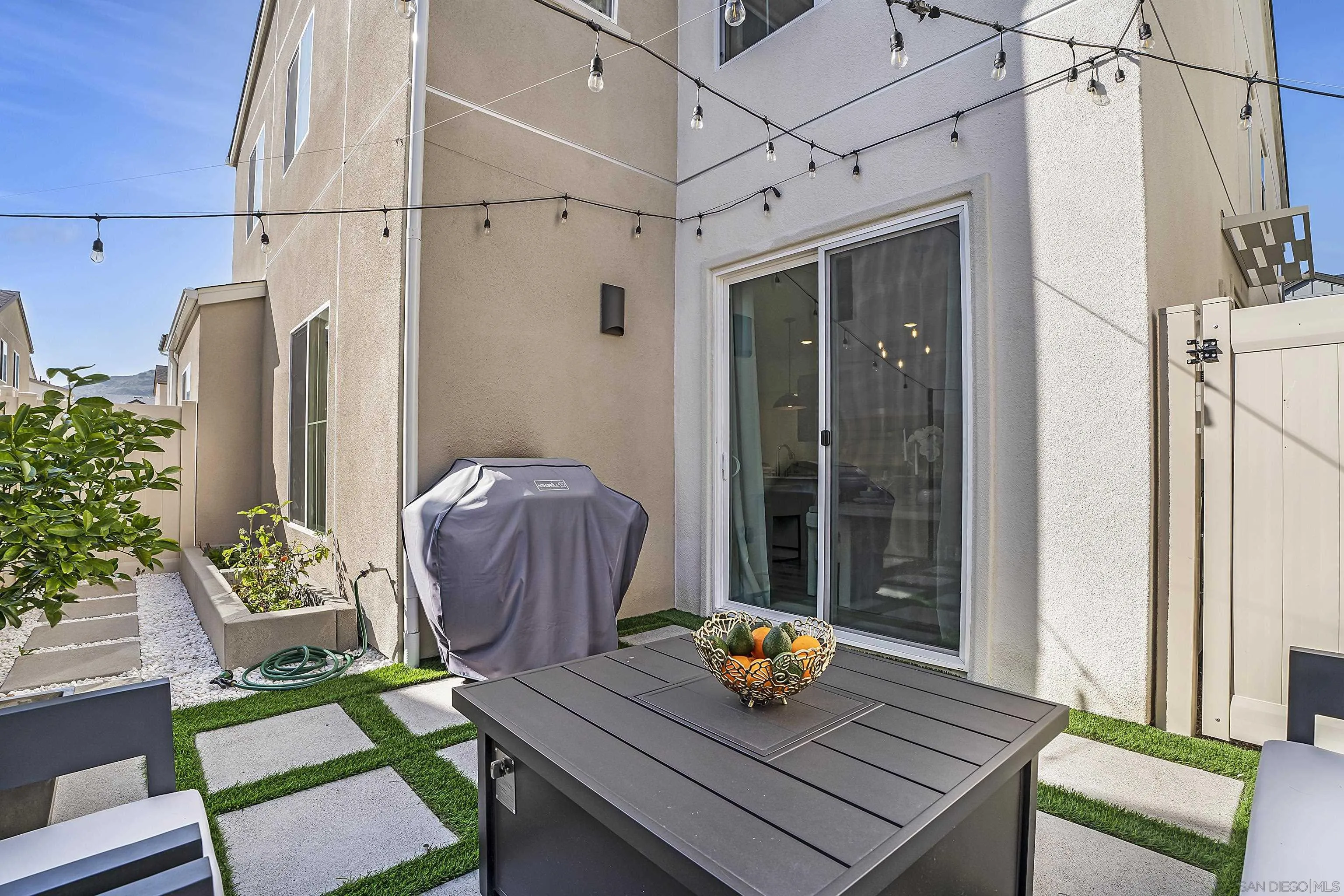 223 Foliage Place Fallbrook, CA 92028 - Photo 24 of 46 a view of a dining room with furniture window and wooden floor