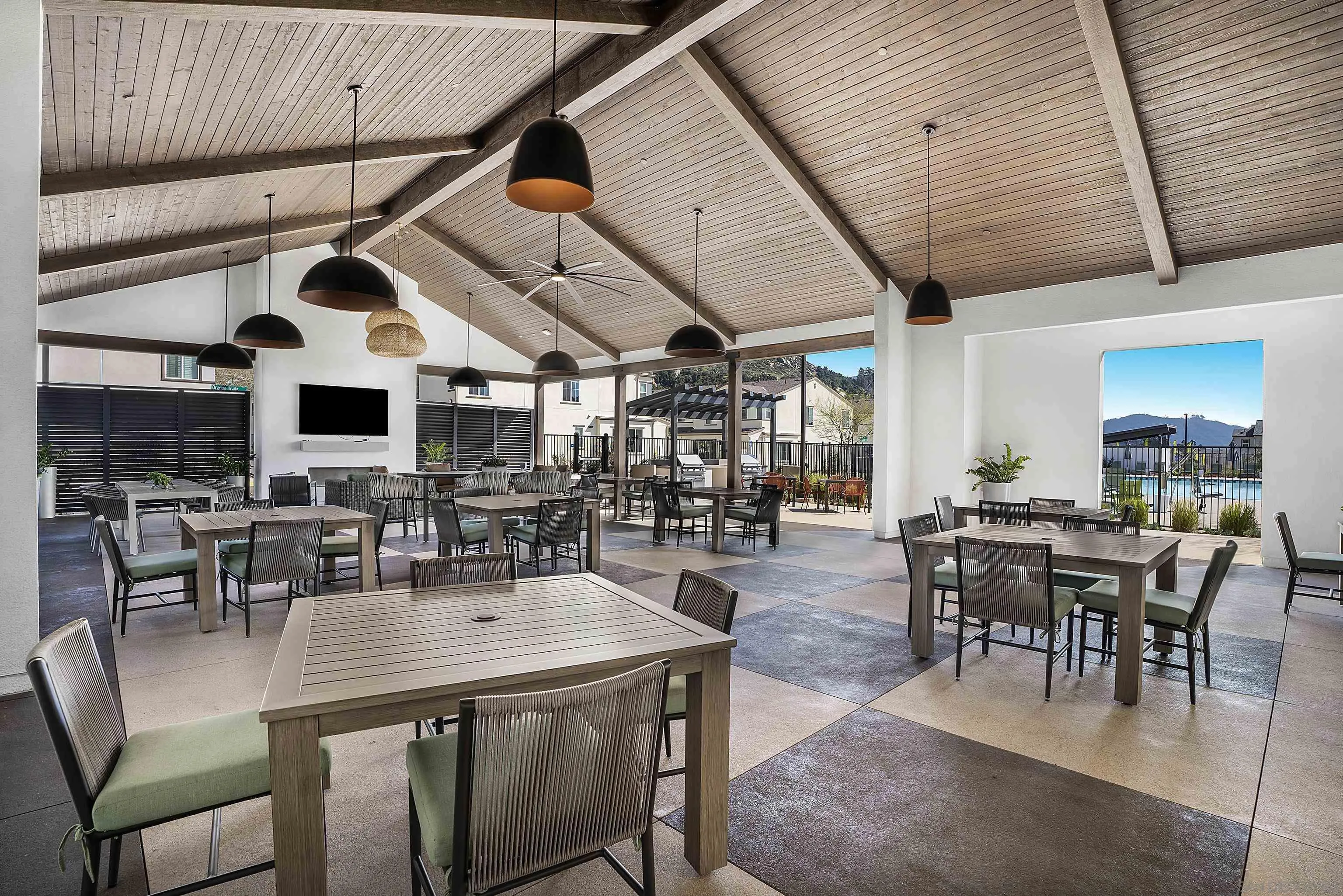 223 Foliage Place Fallbrook, CA 92028 - Photo 27 of 46 a view of a dining hall with many windows