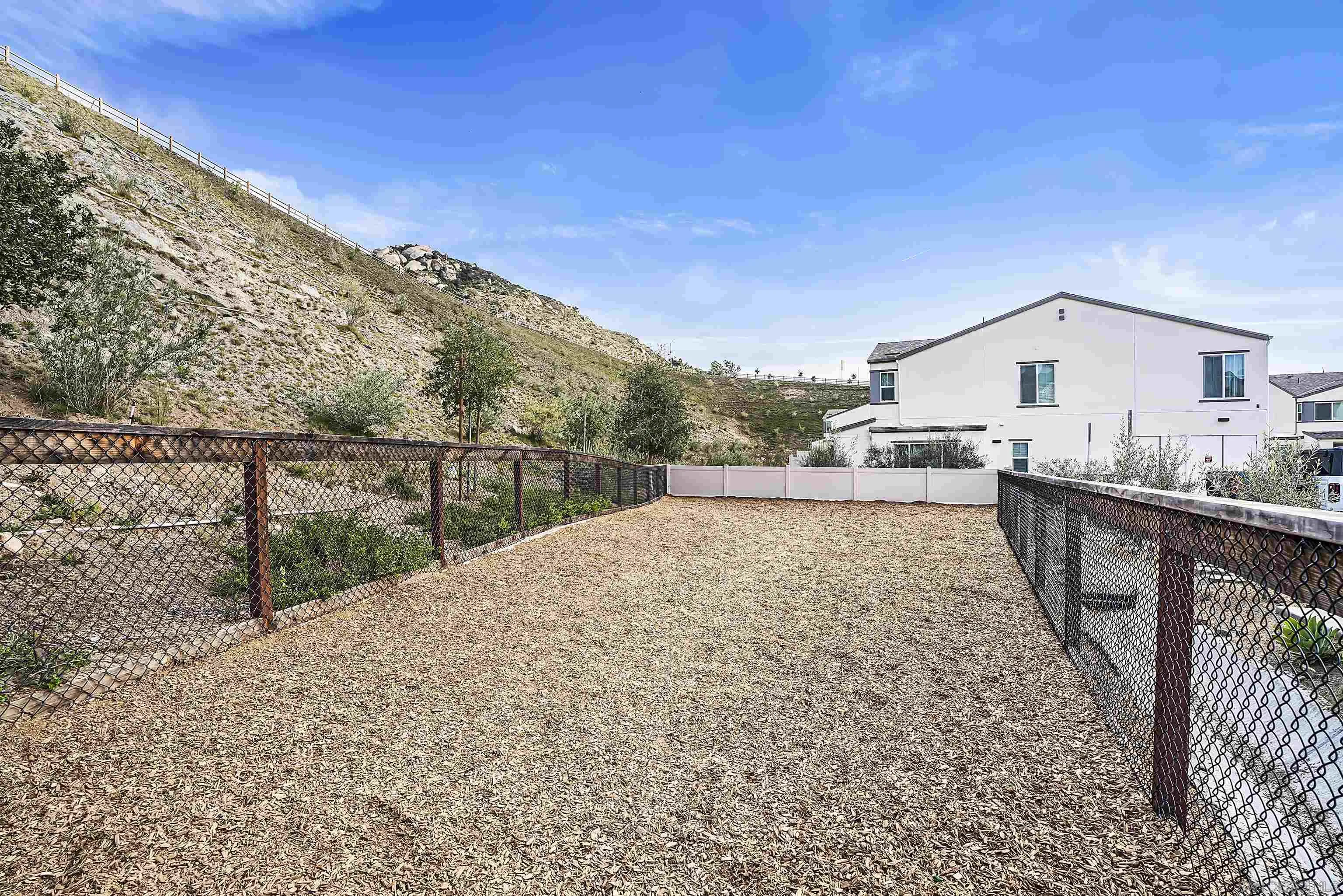 223 Foliage Place Fallbrook, CA 92028 - Photo 35 of 46 a view of a house with a backyard