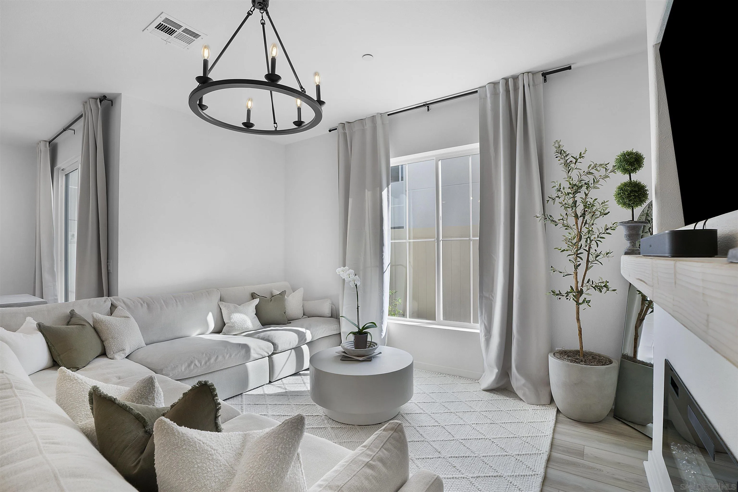 223 Foliage Place Fallbrook, CA 92028 - Photo 9 of 46 a living room with furniture and a window