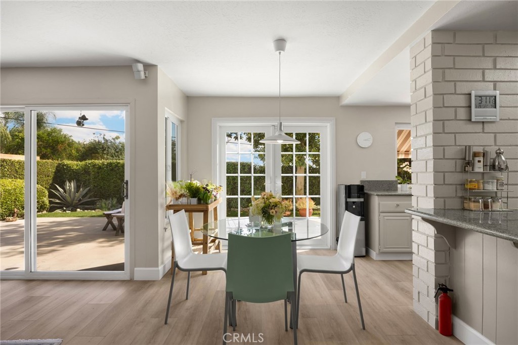 536 Silver Canyon Way Brea, CA 92821 - Photo 14 of 40 a view of a dining room with furniture window and wooden floor