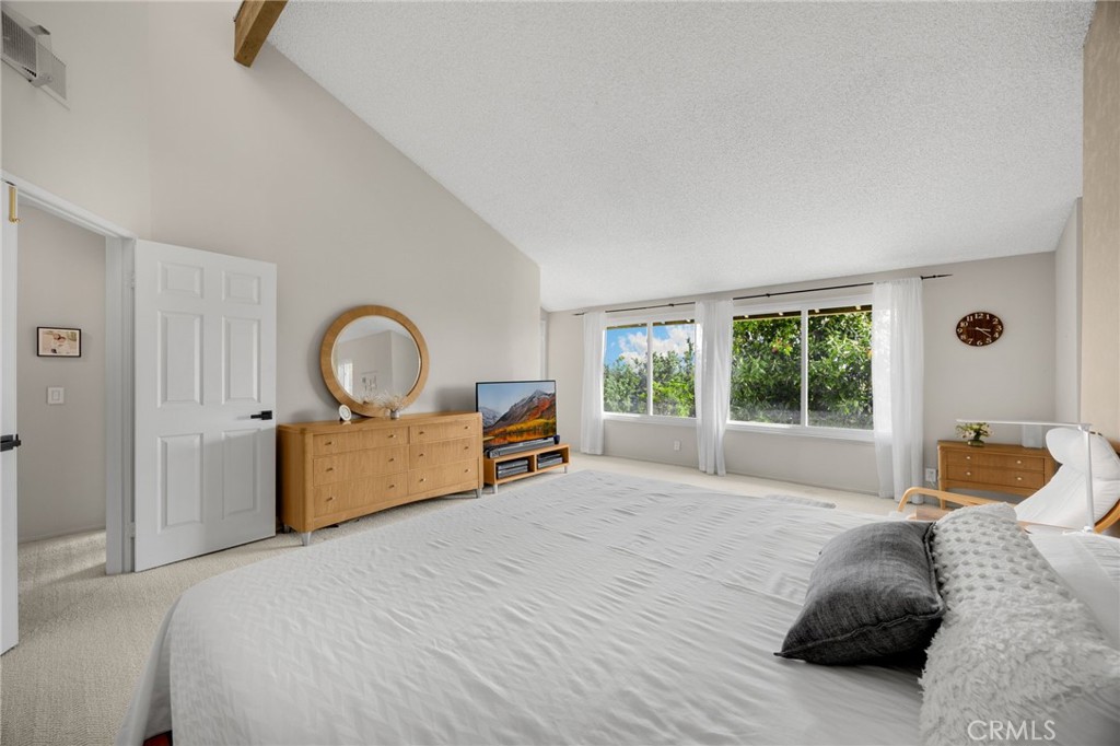 536 Silver Canyon Way Brea, CA 92821 - Photo 27 of 40 a bedroom with a bed and a large window