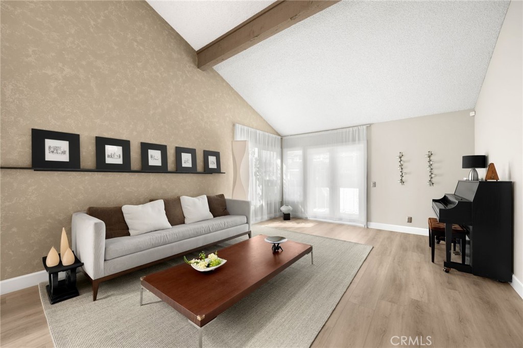 536 Silver Canyon Way Brea, CA 92821 - Photo 3 of 40 a living room with furniture and wooden floor