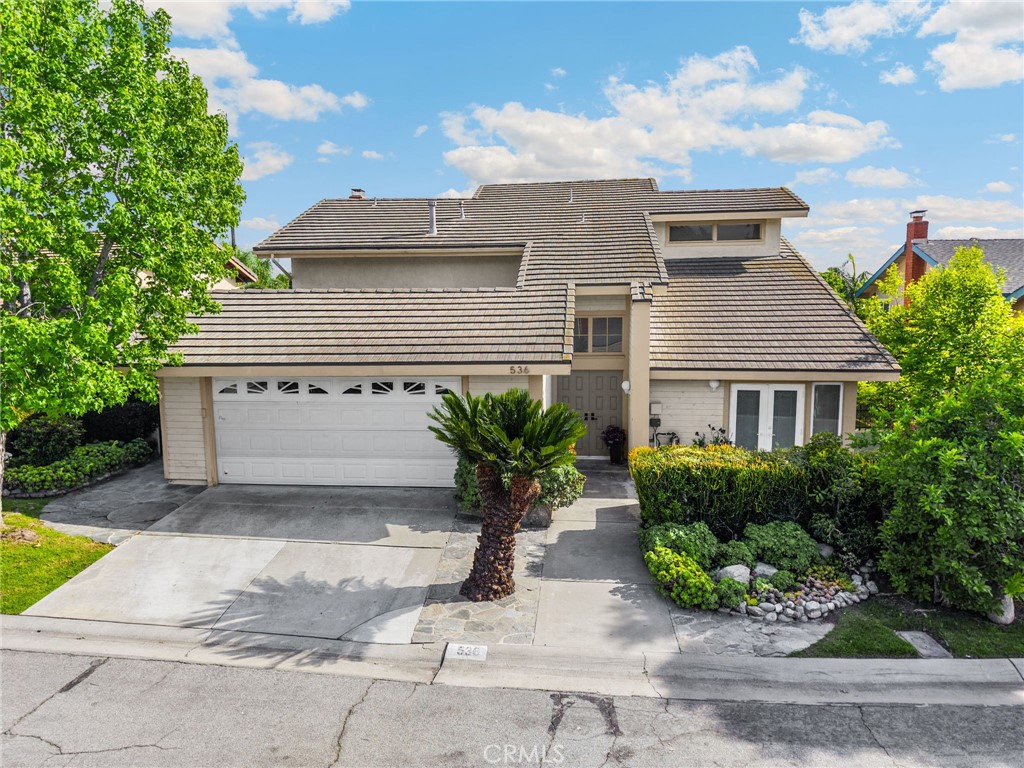 536 Silver Canyon Way Brea, CA 92821 - Photo 40 of 40 a view of a house with a yard and potted plants