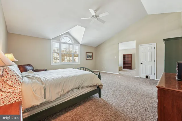 a storage room with lots of wooden furniture and a wooden floors
