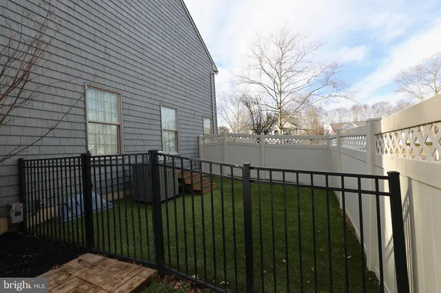 a view of a balcony with a pot