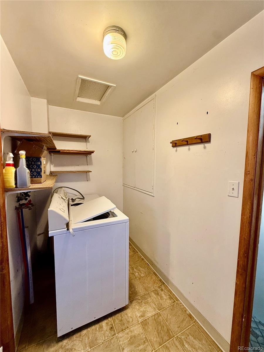 215 Main Street Cheraw, CO 81030 - Photo 11 of 17 a utility room with dryer and washer
