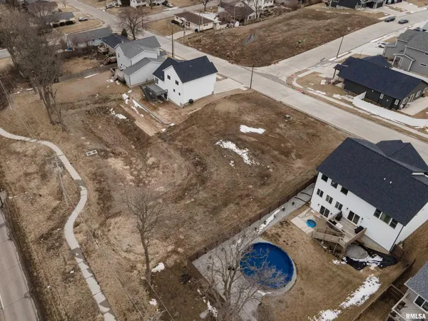 an aerial view of a parking area