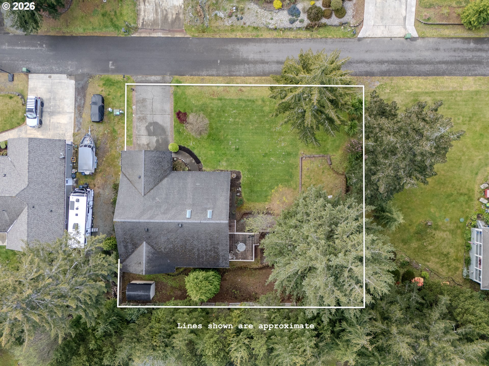 1185 11th Street Southeast Bandon, OR 97411 - Photo 3 of 48 an aerial view of a house with a yard