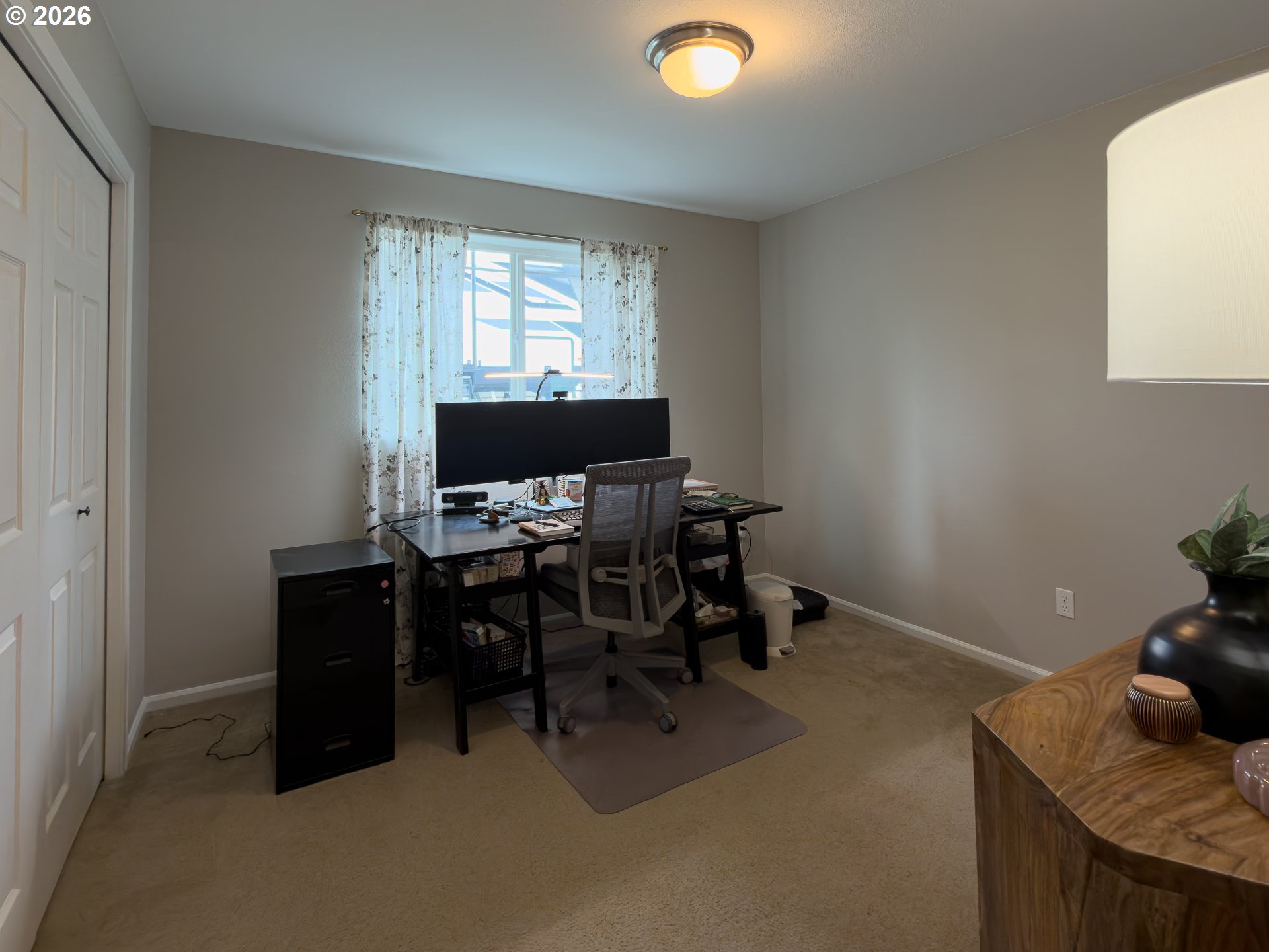 1185 11th Street Southeast Bandon, OR 97411 - Photo 35 of 48 a workspace with furniture and window